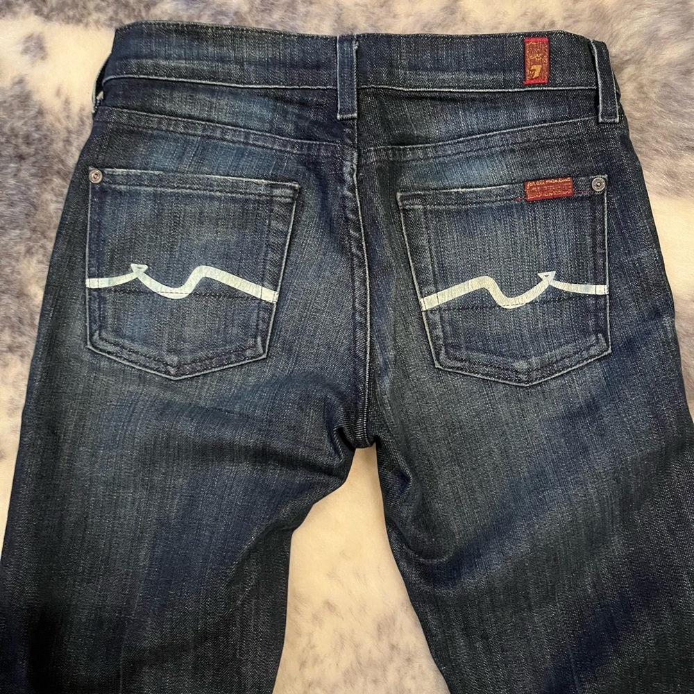 7 For All Mankind flared, slightly stretchy, blue denim jean, size 25